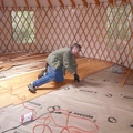 Trey helping lay the floor