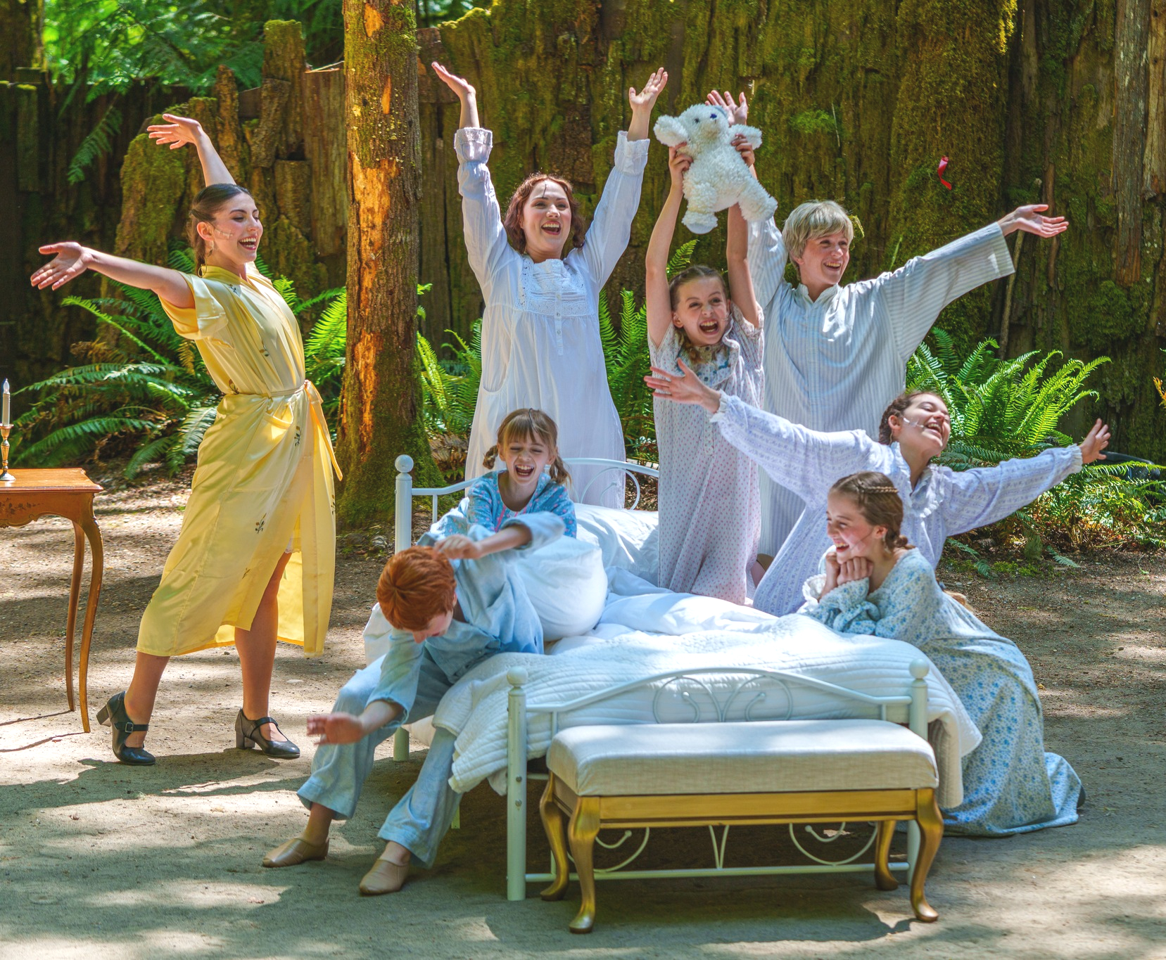 Maria (Ila Faubion Dreessen) singing with the children in The Sound of Music 2023