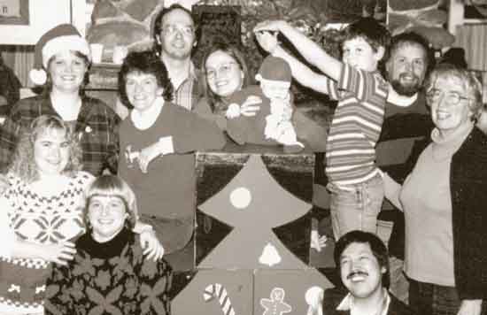 Players come in many guises. Cast of a Christmas Show musical review. - 1989